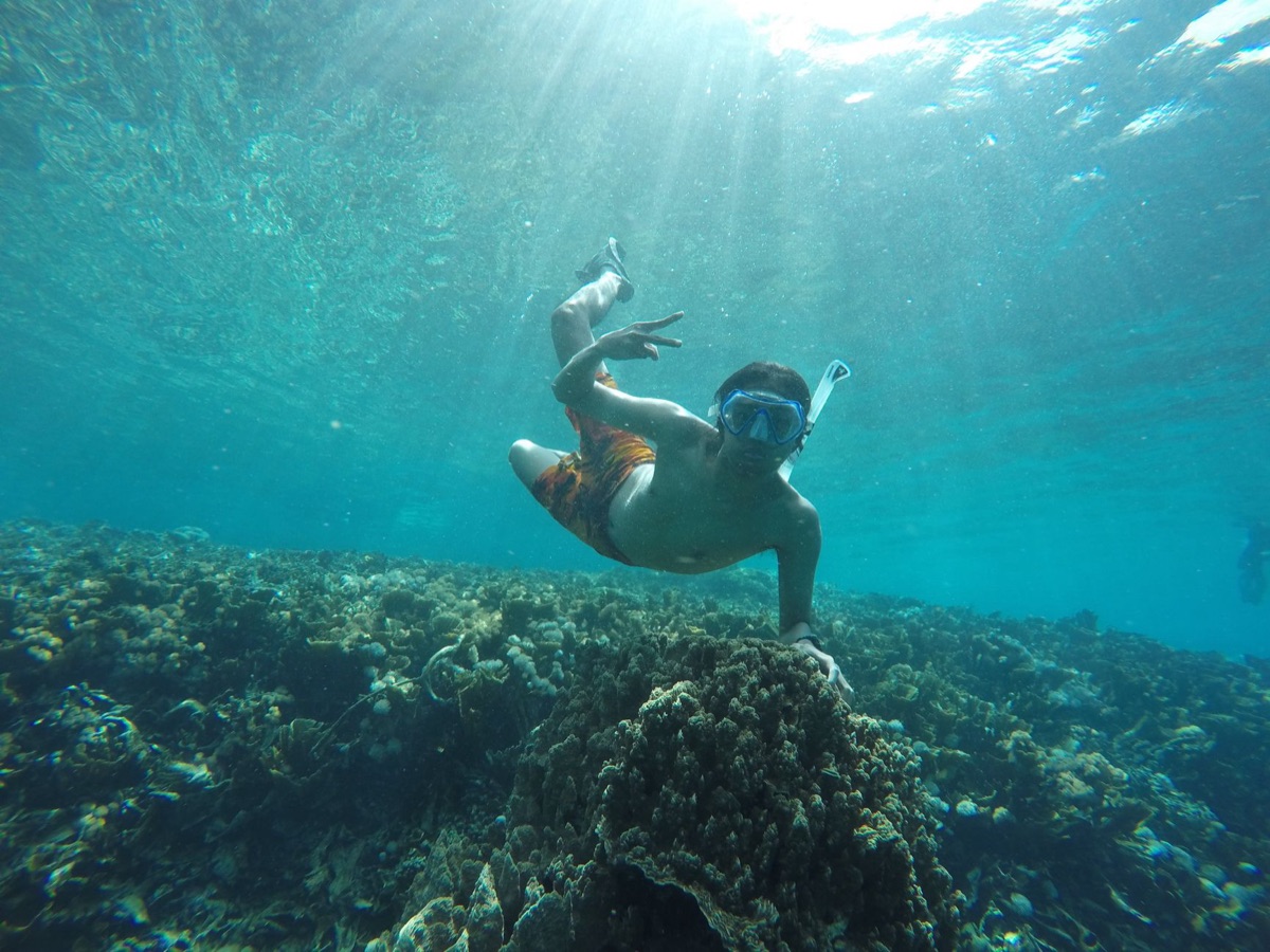 Spiaggia di Guam con attività di snorkeling