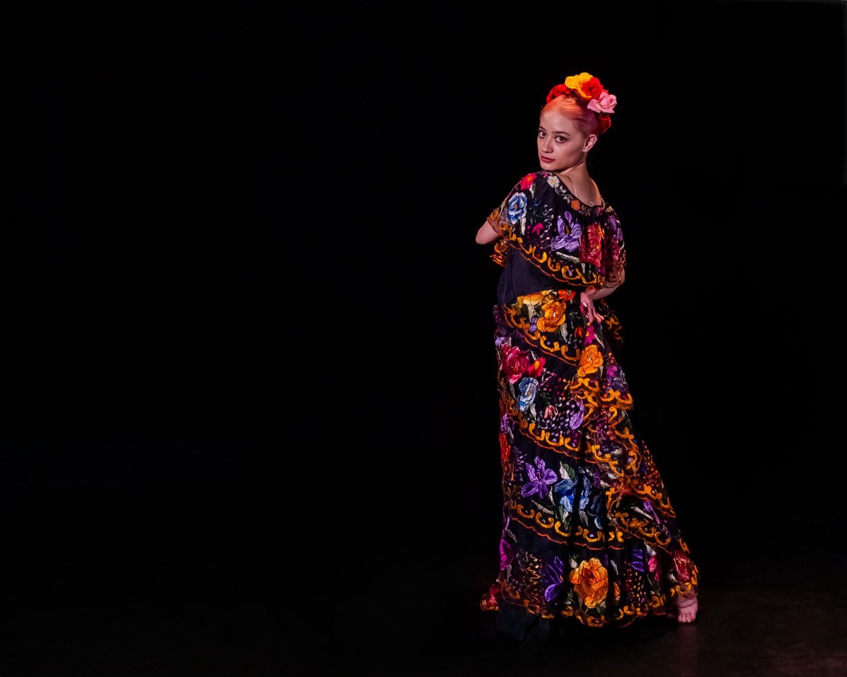 traditional hula dancer in flowy dress